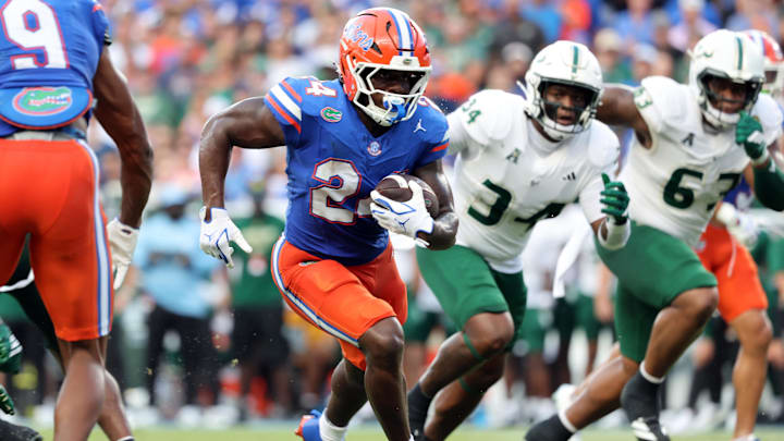 Sep 6, 2025; Gainesville, Florida, USA; Florida Gators running back Ja'Kobi Jackson (24) runs with the ball against the South Florida Bulls during the second quarter at Ben Hill Griffin Stadium. Mandatory Credit: Kim Klement Neitzel-Imagn Images