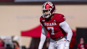 Oct 26, 2024; Bloomington, Indiana, USA; Indiana Hoosiers defensive lineman Jacob Mangum-Farrar (7) prepares for a snap during the third quarter against the Washington Huskies at Memorial Stadium. Mandatory Credit: Jacob Musselman-Imagn Images