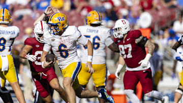 Nov 1, 2025; Stanford, California, USA; Pittsburgh Panthers quarterback Mason Heintschel (6) runs the ball against the Stanford Cardinal during the third quarter at Stanford Stadium. Mandatory Credit: John Hefti-Imagn Images