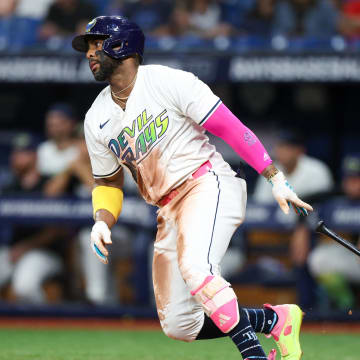 Jul 12, 2024; St. Petersburg, Florida, USA; Tampa Bay Rays first baseman Yandy Diaz (2) singles against the Cleveland Guardians in the seventh inning at Tropicana Field.
