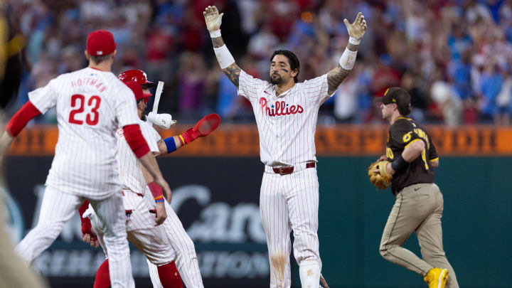 Jun 18, 2024; Philadelphia, Pennsylvania, USA; Philadelphia Phillies outfielder Nick Castellanos (8) celebrates with his team after hitting a game winning RBI double during the ninth inning against the San Diego Padres at Citizens Bank Park. Mandatory Credit: Bill Streicher-USA TODAY Sports