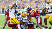 Oct 18, 2025; Tempe, Arizona, USA; Arizona State Sun Devils running back Raleek Brown (3) scores a touchdown against the Texas Tech Red Raiders in the fourth quarter at Mountain America Stadium. Mandatory Credit: Mark J. Rebilas-Imagn Images