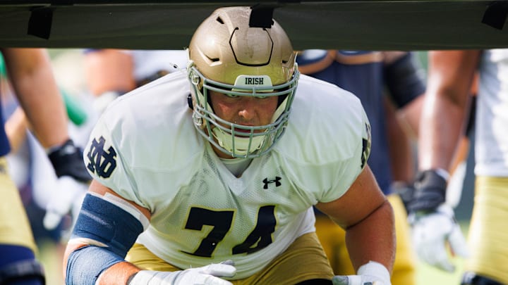 Notre Dame offensive lineman Billy Schrauth participates in a drill during a Notre Dame football practice at Irish Athletic Center on Tuesday, Aug. 6, 2024, in South Bend.