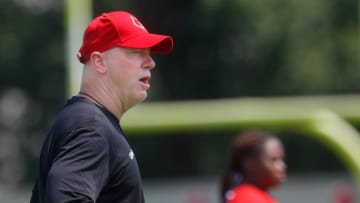 Louisville football head coach Jeff Brohm gives out instructions during one of their fall practices