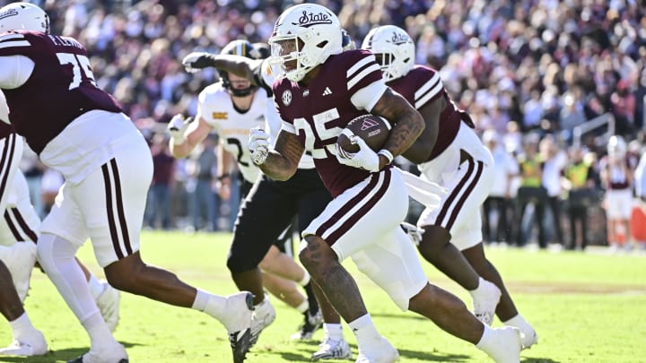 Nov 18, 2023; Starkville, Mississippi, USA; Mississippi State Bulldogs running back Jeffery Pittman (25) runs the ball against the Southern Miss Golden Eagles during the third quarter at Davis Wade Stadium at Scott Field. Mandatory Credit: Matt Bush-USA TODAY Sports