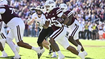 Nov 18, 2023; Starkville, Mississippi, USA; Mississippi State Bulldogs running back Jeffery Pittman (25) runs the ball against the Southern Miss Golden Eagles during the third quarter at Davis Wade Stadium at Scott Field. Mandatory Credit: Matt Bush-USA TODAY Sports