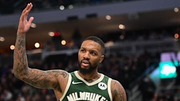 Dec 16, 2023; Milwaukee, Wisconsin, USA;  Milwaukee Bucks guard Damian Lillard (0) reacts after scoring a basket in the third quarter against the Detroit Pistons at Fiserv Forum. Mandatory Credit: Benny Sieu-Imagn Images