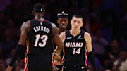 Nov 4, 2024; Miami, Florida, USA; Miami Heat guard Tyler Herro (14) celebrates with Miami Heat center Bam Adebayo (13) after scoring against the Sacramento Kings during the fourth quarter at Kaseya Center. Mandatory Credit: Sam Navarro-Imagn Images
