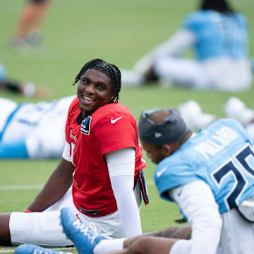 Tennessee Titans quarterback Cam Ward and running back Tony Pollard
