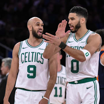 Apr 8, 2025; New York, New York, USA; Boston Celtics forward Jayson Tatum (0) and Boston Celtics guard Derrick White (9) react during the first half against the New York Knicks at Madison Square Garden. Mandatory Credit: John Jones-Imagn Images