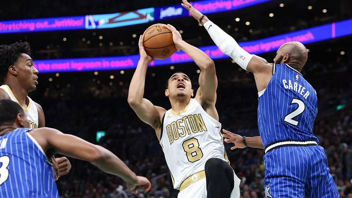 Apr 12, 2026; Boston, Massachusetts, USA; Boston Celtics guard John Tonje (8) shoots during the second half against the Orlando Magic at TD Garden. Mandatory Credit: Paul Rutherford-Imagn Images