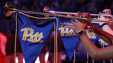 Jan 18, 2025; Pittsburgh, Pennsylvania, USA; The University of Pittsburgh Panthers band herald trumpets play the national anthem before the game against the Clemson Tigers at the Petersen Events Center. Mandatory Credit: Charles LeClaire-Imagn Images