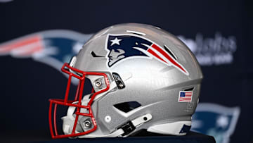Jan 17, 2024; Foxborough, MA, USA; A New England Patriots helmet sits on a table prior to a press conference at Gillette Stadium. Mandatory Credit: Eric Canha-Imagn Images