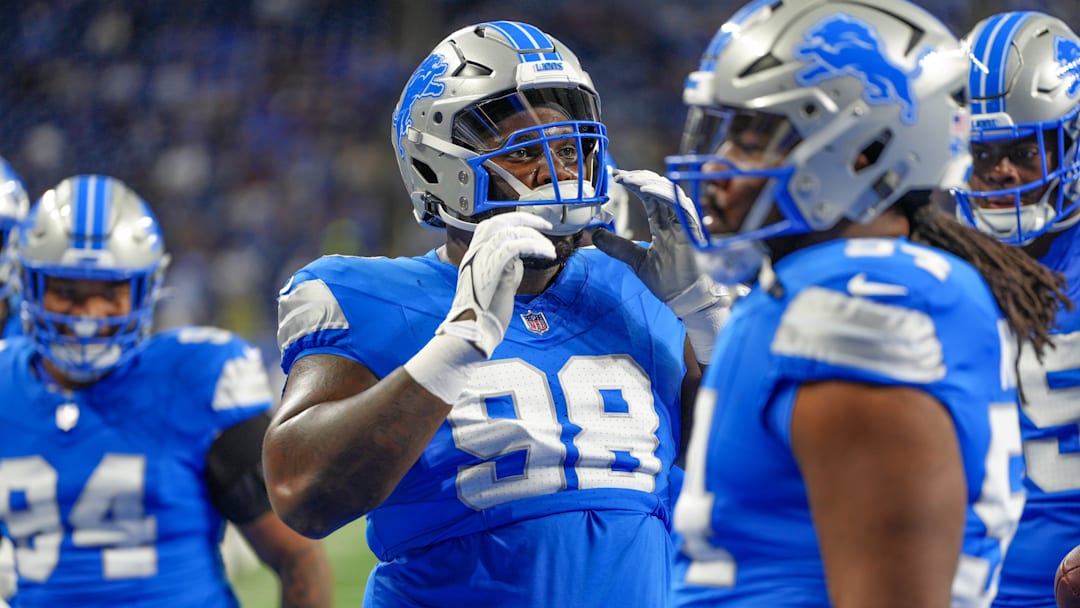 Detroit Lions DJ Reader (98) warms up before the NFL game against the Tennessee Titans at Ford Field in Detroit on Oct. 27, 2024.