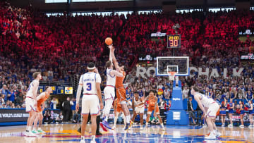Feb 24, 2024; Lawrence, Kansas, USA; Kansas Jayhawks center Hunter Dickinson (1) and Texas Longhorns