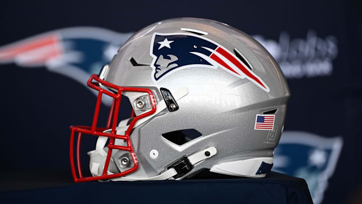 Jan 17, 2024; Foxborough, MA, USA; A New England Patriots helmet sits on a table prior to a press conference at Gillette Stadium. Mandatory Credit: Eric Canha-Imagn Images