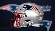 Jan 17, 2024; Foxborough, MA, USA; A New England Patriots helmet sits on a table prior to a press conference at Gillette Stadium. Mandatory Credit: Eric Canha-Imagn Images