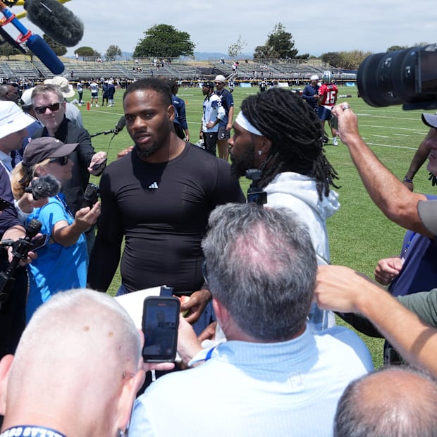 Dallas Cowboys defensive end Micah Parsons and cornerback Trevon Diggs talk to media during training camp.