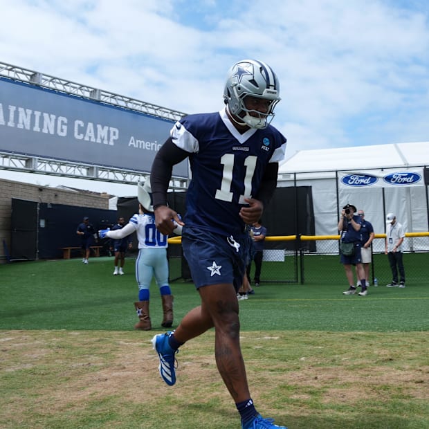 Dallas Cowboys defensive end Micah Parsons enters the field during training camp at the River Ridge Fields.