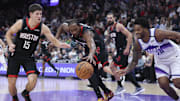 Nov 30, 2025; Salt Lake City, Utah, USA; Houston Rockets forward Kevin Durant (7) reaches for the ball with guard Reed Sheppard (15) as Utah Jazz forward Brice Sensabaugh (28) defends during the second quarter at Delta Center. Mandatory Credit: Rob Gray-Imagn Images