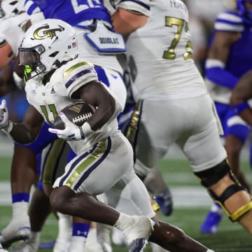 Aug 31, 2024; Atlanta, Georgia, USA; Georgia Tech Yellow Jackets running back Jamal Haynes (11) runs the ball against Georgia State Panthers in the fourth quarter at Bobby Dodd Stadium at Hyundai Field. Mandatory Credit: Brett Davis-USA TODAY Sports