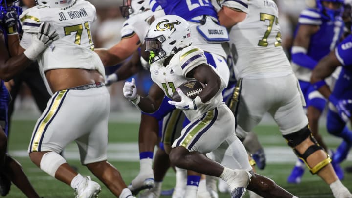 Aug 31, 2024; Atlanta, Georgia, USA; Georgia Tech Yellow Jackets running back Jamal Haynes (11) runs the ball against Georgia State Panthers in the fourth quarter at Bobby Dodd Stadium at Hyundai Field. Mandatory Credit: Brett Davis-USA TODAY Sports