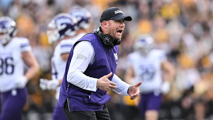 Oct 26, 2024; Iowa City, Iowa, USA; Northwestern Wildcats head coach David Braun reacts during the third quarter against the Iowa Hawkeyes at Kinnick Stadium. Mandatory Credit: Jeffrey Becker-Imagn Images Oct 26, 2024; Iowa City, Iowa, USA; Northwestern Wildcats head coach David Braun reacts during the third quarter against the Iowa Hawkeyes at Kinnick Stadium. Mandatory Credit: Jeffrey Becker-Imagn Images