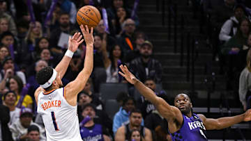 Nov 26, 2025; Sacramento, California, USA; Phoenix Suns guard Devin Booker (1) takes a shot against the Sacramento Kings during the second quarter at Golden 1 Center. Mandatory Credit: Ed Szczepanski-Imagn Images