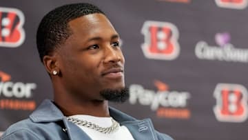 Cincinnati Bengals receiver Tee Higgins smiles during a press conference to announce the signing of new contracts for receivers Ja’Marr Chase and Tee Higgins at Paycor Stadium in downtown Cincinnati on Tuesday, March 18, 2025. Chase becomes the new highest-paid non-quarterback player in the NFL.