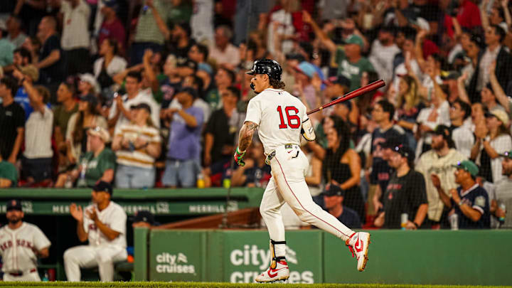 Jul 8, 2025; Boston, Massachusetts, USA; Boston Red Sox outfielder Jarren Duran (16) hits a home run against the Colorado Rockies in the seventh inning at Fenway Park. Mandatory Credit: David Butler II-Imagn Images