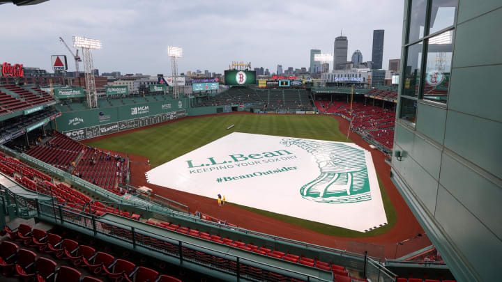 A general view of the rain tarp on the field at Fenway Park.