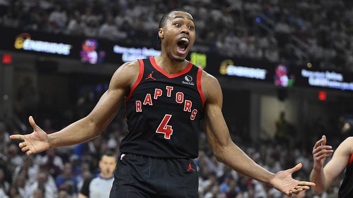 Apr 29, 2026; Cleveland, Ohio, USA; Toronto Raptors forward Scottie Barnes (4) and forward Sandro Mamukelashvili (54) react against the Cleveland Cavaliers in the first quarter of game five of the first round of the 2026 NBA Playoffs at Rocket Arena. Mandatory Credit: David Richard-Imagn Images