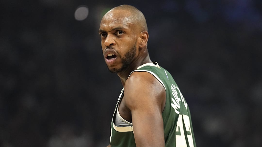 Apr 30, 2024; Milwaukee, Wisconsin, USA;  Milwaukee Bucks forward Khris Middleton (22) reacts to a call during the first quarter against the Indiana Pacers during game five of the first round for the 2024 NBA playoffs at Fiserv Forum. Mandatory Credit: Jeff Hanisch-Imagn Images