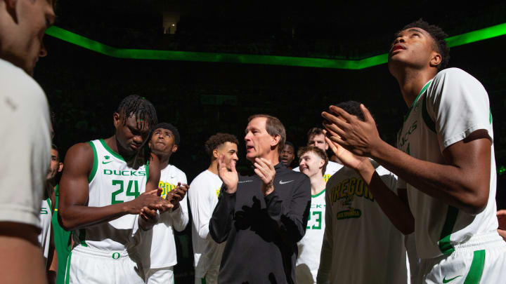 Oregon coach Dana Altman brings his team together before their game against Michigan at Matthew Knight Arena in Eugene, Saturday, Dec. 2, 2023.