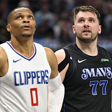 May 3, 2024; Dallas, Texas, USA; LA Clippers guard Russell Westbrook (0) and Dallas Mavericks guard Luka Doncic (77) look for the ball on a foul shot during the first quarter during game six of the first round for the 2024 NBA playoffs at American Airlines Center. 