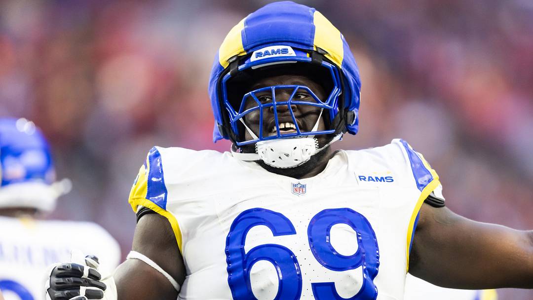 Dec 7, 2025; Glendale, Arizona, USA; Los Angeles Rams  offensive lineman Kevin Dotson (69) against the Arizona Cardinals at State Farm Stadium. Mandatory Credit: Mark J. Rebilas-Imagn Images