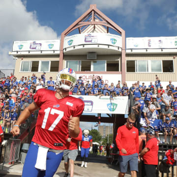 With a packed stands screaming his name, Bills quarterback Josh Allen runs onto the field on the last day of the Buffalo Bills training camp at St John Fisher University in Rochester Thursday, Aug. 11, 2022.

Sd 081122 Bills Camp 2 Spts