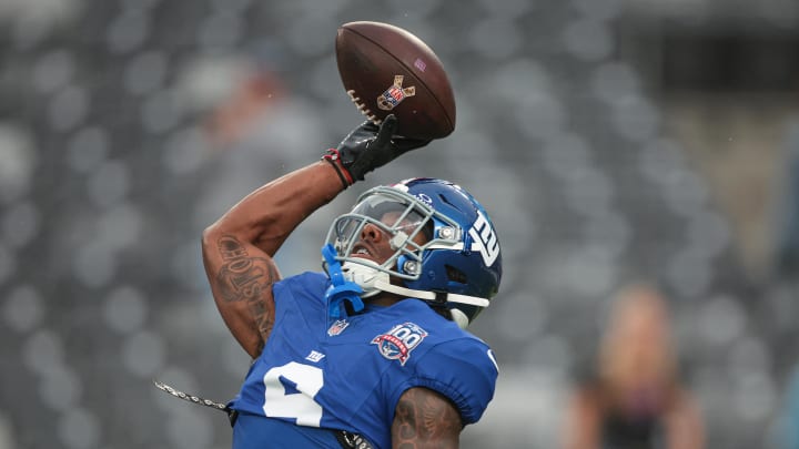 Aug 8, 2024; East Rutherford, New Jersey, USA; New York Giants wide receiver Malik Nabers (9) makes a catch during warm ups before the game against the Detroit Lions at MetLife Stadium.  