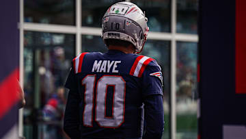 Jan 5, 2025; Foxborough, Massachusetts, USA; New England Patriots quarterback Drake Maye (10) walks to the field to warm up before the start of the game against the Buffalo Bills at Gillette Stadium. Mandatory Credit: David Butler II-Imagn Images