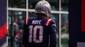 New England Patriots quarterback Drake Maye (10) walks to the field to warm up before the start of the game against the Buffalo Bills at Gillette Stadium.