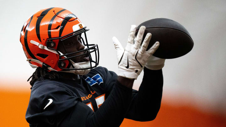 Cincinnati Bengals linebacker Maema Njongmeta (45) catches a pass during an interception drill at Bengals spring practice at the IEL Indoor Facility in Cincinnati on Wednesday, June 12, 2024.