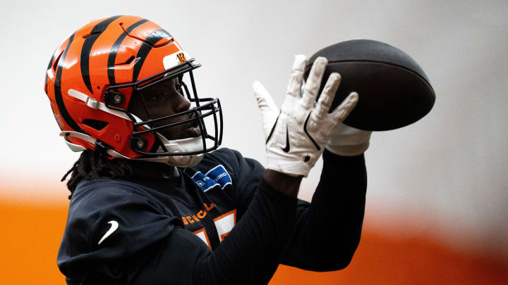 Cincinnati Bengals linebacker Maema Njongmeta (45) catches a pass during an interception drill at Bengals spring practice at the IEL Indoor Facility in Cincinnati on Wednesday, June 12, 2024.