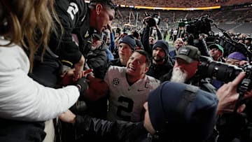 Vanderbilt quarterback Diego Pavia (2) celebrates with family and friends after defeating Tennessee at Neyland Stadium in Knoxville, Tenn., Saturday, Nov. 29, 2025.