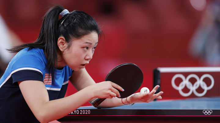 Jul 26, 2021; Tokyo, Japan; Lily Zhang (USA) competes against Offiong Edem (NGR) in singles play during the Tokyo 2020 Olympic Summer Games at Tokyo Metropolitan Gym. Mandatory Credit: Yukihito Taguchi-USA TODAY Sports