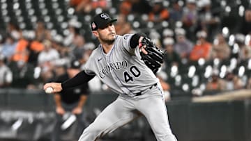 Jul 25, 2025; Baltimore, Maryland, USA;  Colorado Rockies pitcher Tyler Kinley (40) delivers a pitch during the eighth inning against the Baltimore Orioles at Oriole Park at Camden Yards. Mandatory Credit: James A. Pittman-Imagn Images