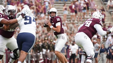 Sep 6, 2025; College Station, Texas, USA; Texas A&M Aggies quarterback Miles O'Neill (16) with the football during the second half against the Utah State Aggies at Kyle Field. Mandatory Credit: Sean Thomas-Imagn Images