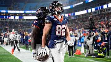 Dec 6, 2025; Charlotte, NC, USA; Virginia Cavaliers wide receiver Eli Wood (82) celebrates a touchdown in the second half against the Duke Blue Devils during the 2025 ACC Championship game at Bank of America Stadium. Mandatory Credit: Jim Dedmon-Imagn Images