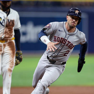 Aug 13, 2024; St. Petersburg, Florida, USA; Houston Astros third baseman Alex Bregman (2) rounds third base to score a run against the Tampa Bay Rays in the third inning at Tropicana Field. Mandatory Credit: Nathan Ray Seebeck-USA TODAY Sports