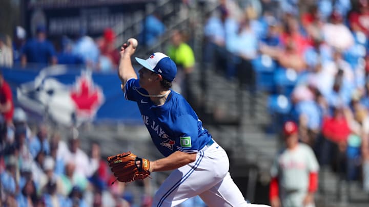 Feb 24, 2024; Dunedin, Florida, USA;  Toronto Blue Jays Chad Dallas throws a pitch against the Philadelphia Phillies in the first inning at TD Ballpark. Mandatory Credit: Nathan Ray Seebeck-Imagn Images