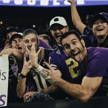 Husky fans enjoy themselves at the CFP national championship game.